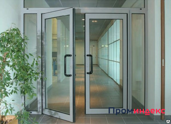 Фото Оконно-дверные системы с маятниковыми дверьми