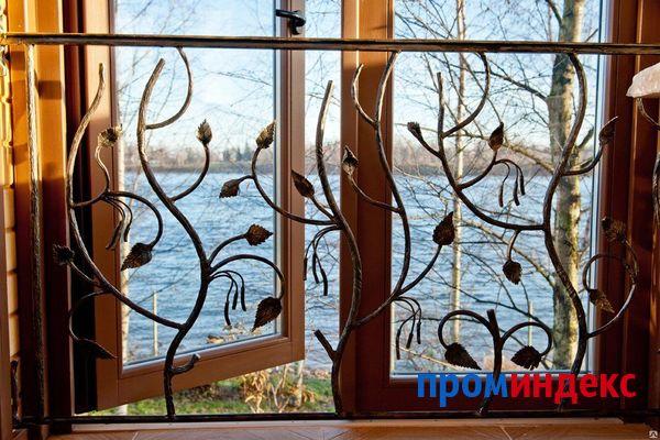 Фото Ажурная решетка на окно из металла