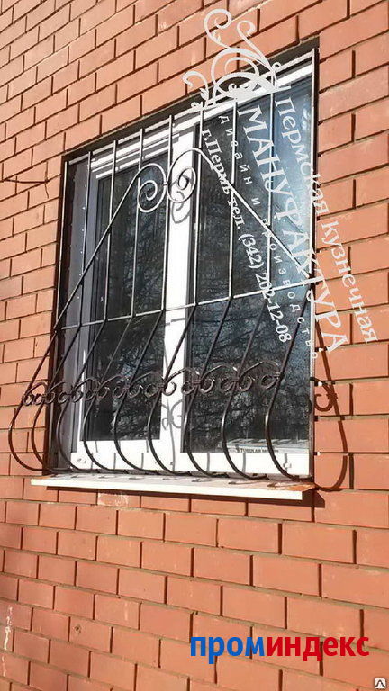 Фото Кованая решетка на окно