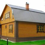 фото Отделка металлосайдингом деревянного дома