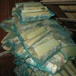 фото Сухие берёзовые дрова в сетках по 40 литров