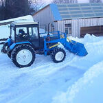 фото Уборка снега трактором
