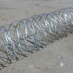 Фото №2 Колючая проволока Егоза, спиральный барьер безопасности