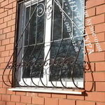 фото Кованая решетка на окно